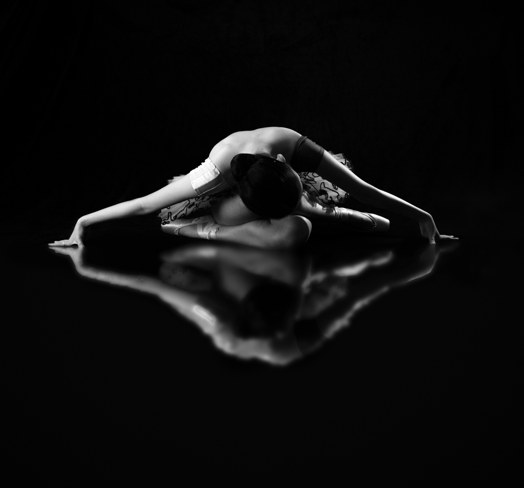 composite mirror image of a dancer, striking lighting